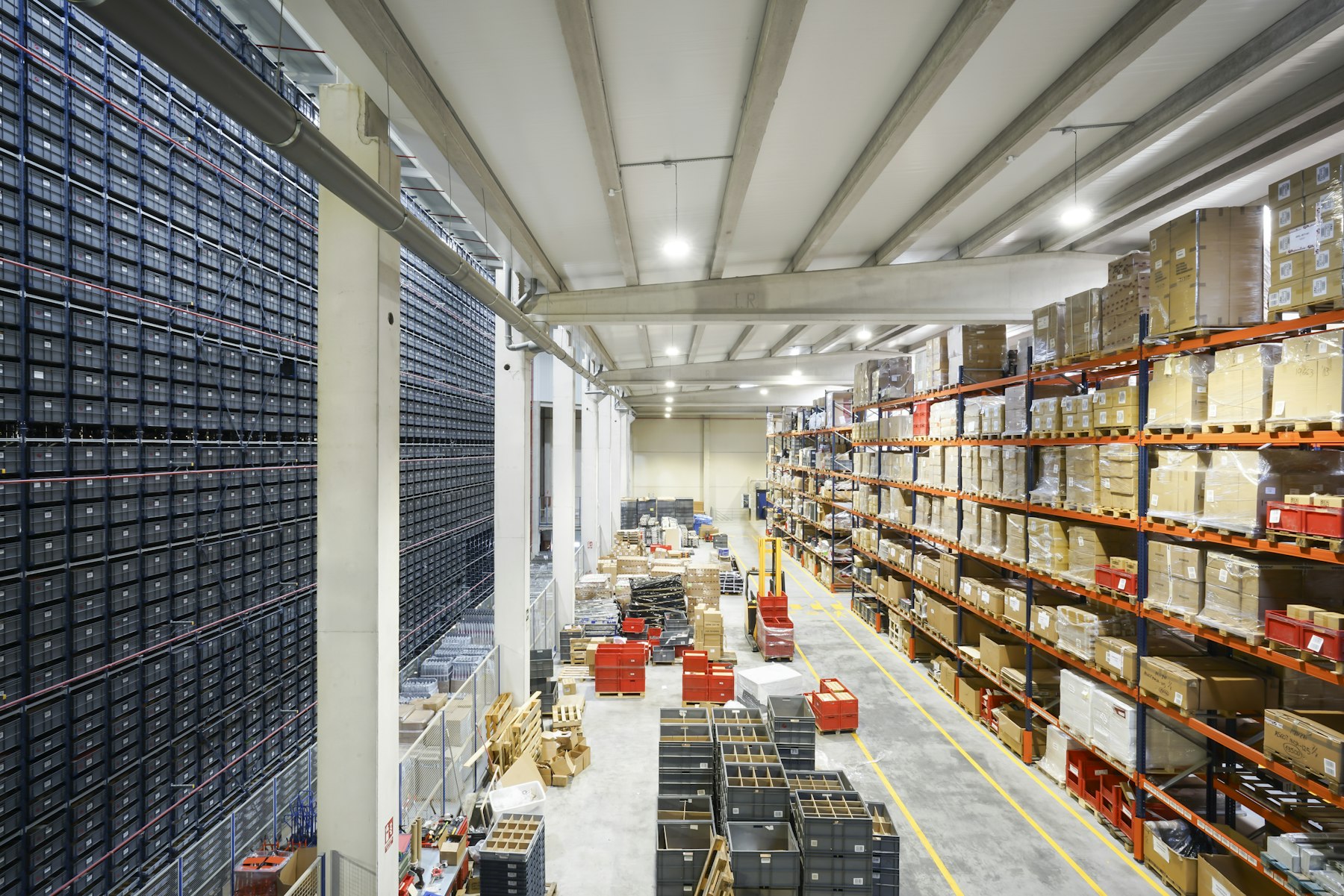 A large warehouse filled with lots of boxes